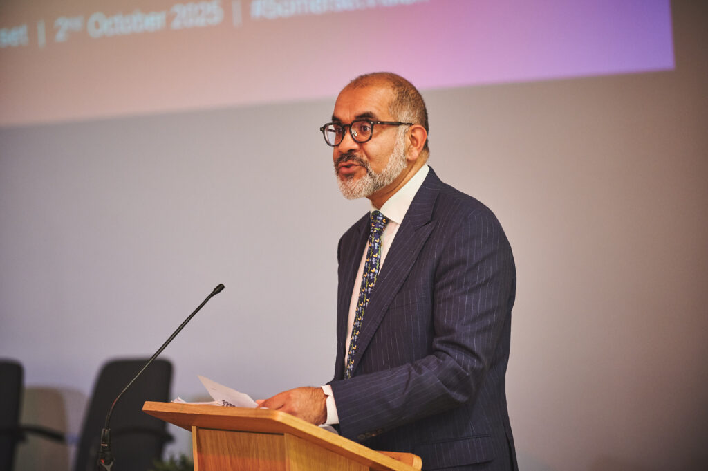 The Lord-Lieutenant of Somerset, Mohammed Saddiq, delivering his speech on stage.