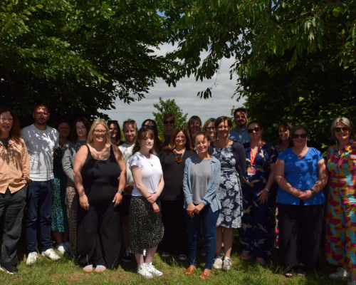 A photo of the Spark Somerset team posing in the sunshine.
