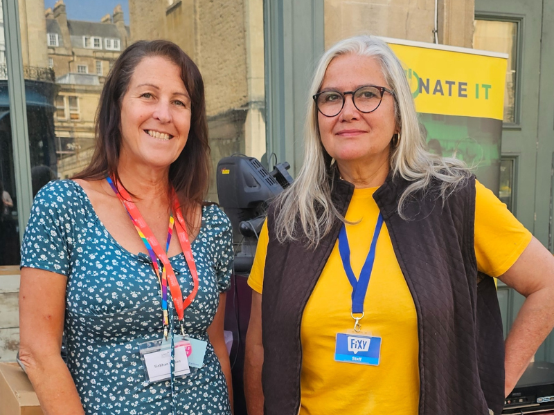 A member of the Spark Somerset team posing next to a team member from Fixy, a Spark iT partner.