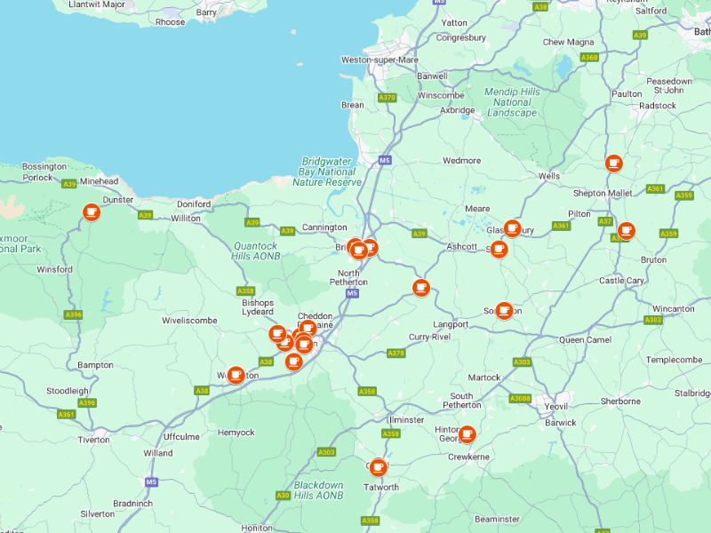 Screen capture of a map of Somerset, with orange and white teacup icons indicating the location of Warm Welcome spaces